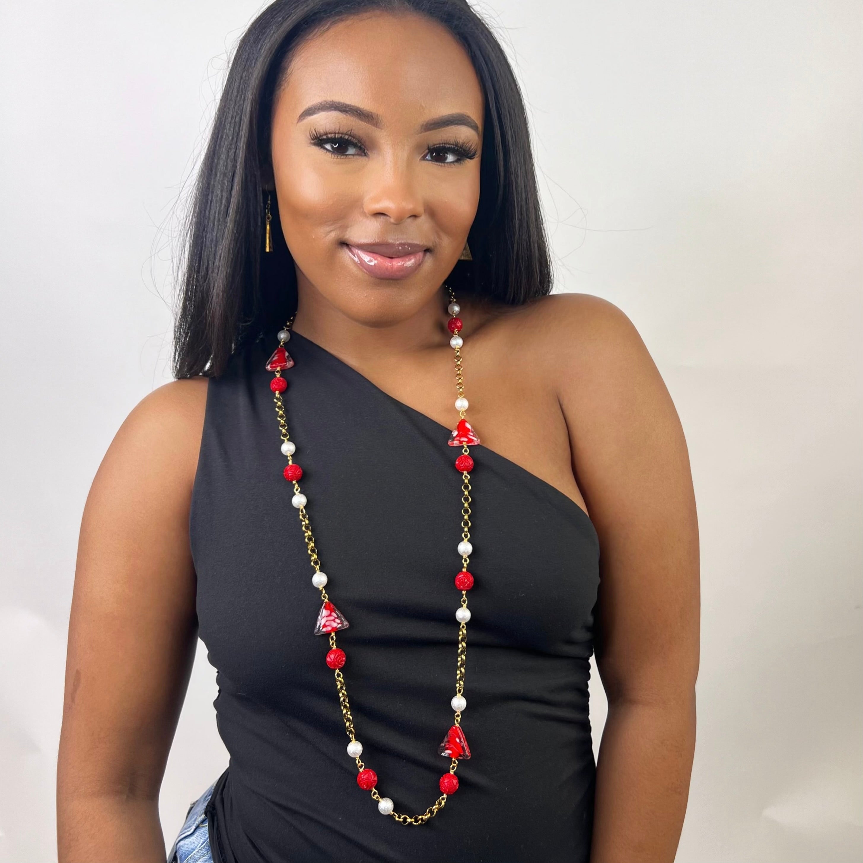 Delta Pyramid Carved Coral Necklace