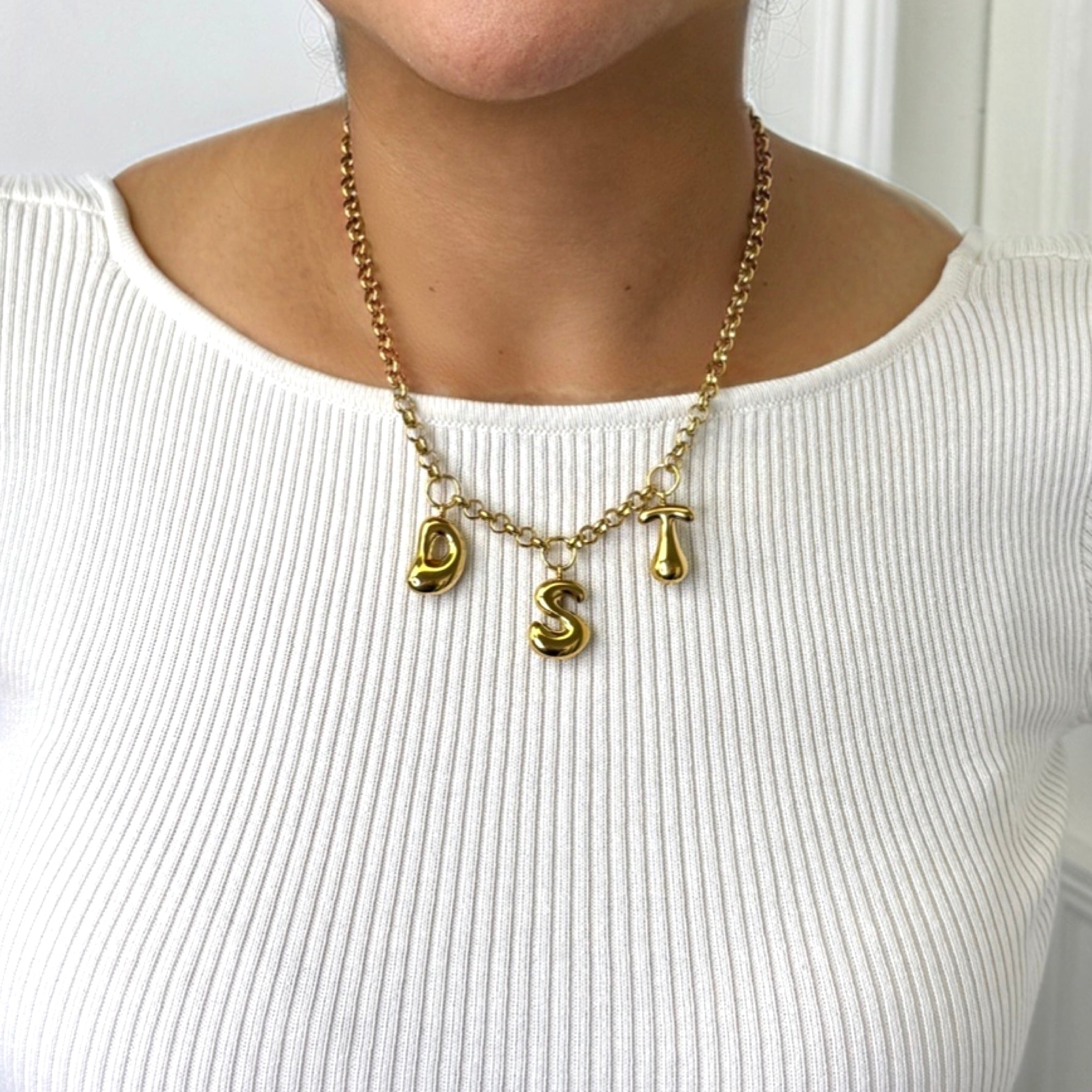 Delta Bubble Letter Necklace