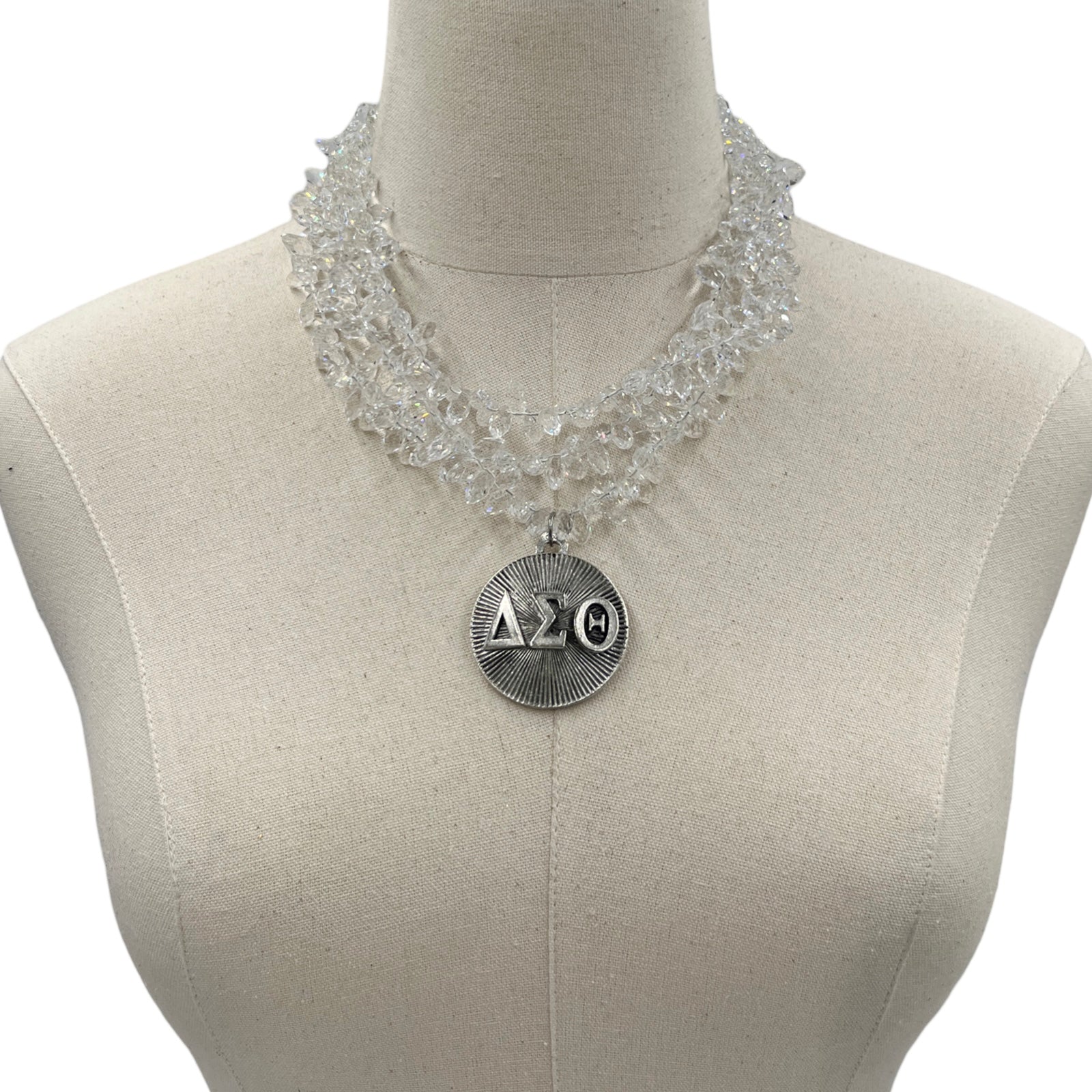 Delta Clear Snaps Necklace