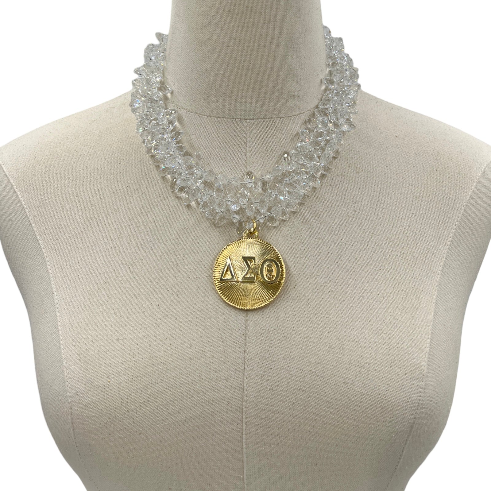 Delta Clear Snaps Necklace