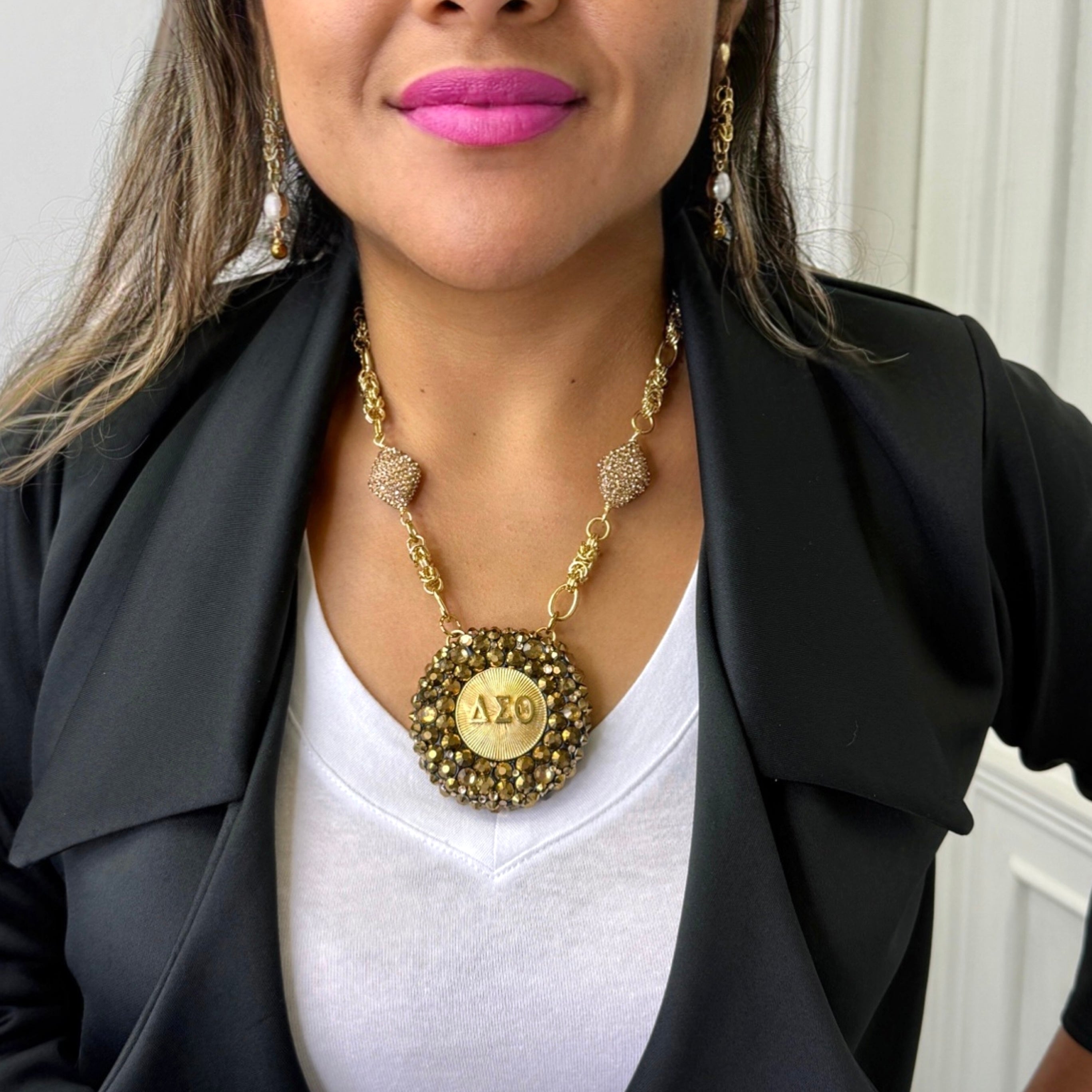 Delta Clap Necklace