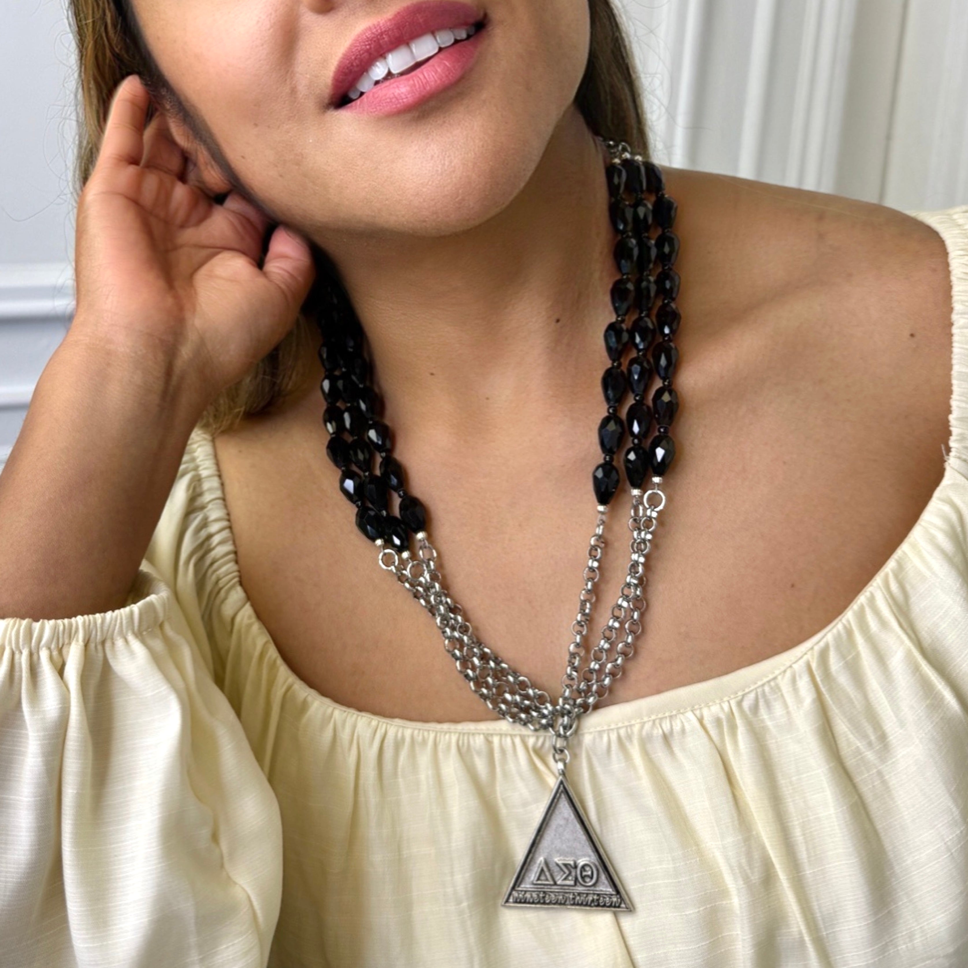 Delta Time Travel Necklace